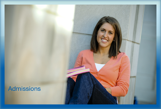 female student sitting outside on campus