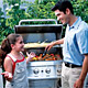 Photo: Father and Daughter Grilling.