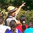 Park Ranger Kupono McDaniel leads a group of children on an educational walk