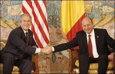 President George W. Bush and President Traian Basescu of Romania, exchange handshakes during their meeting Wednesday, April 2, 2008, in Neptun, Romania.