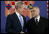 President George W. Bush shakes hands with President Stjepan Mesic of Croatia during arrival ceremonies in honor of the President and Mrs. Bush Friday, April 4, 2008, at the Office of the President in Zagreb.