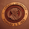 Ezra Cornell on seal on Day Hall