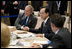 President George W. Bush exchanges handshakes with Prime Minister Yasuo Fukuda of Japan, Tuesday, July 8, 2008, as the G-8 leaders began their morning working session at the Windsor Hotel Toya Resort and Spa in Toyako, Japan.