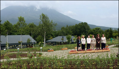 Mrs. Laura Bush and spouses of G-8 leaders pause for the family photo Tuesday, July 8, 2008, during their visit to the village of Makkari on the northern Japanese island of Hokkaido. From left are: Mrs. Margarida Uva Barosso, Mrs. Laureen Harper, Mrs. Kiyoko Fukuda, Mrs. Bush, Mrs. Sarah Brown and Mrs. Svetlana Medvedeva.