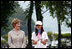 Mrs. Laura Bush stands with Ms. Natsumi Kagawa, age 11, after planting a tree at the Toyako New Mount Showa Memorial Park Wednesday, July 8, 2008, during a tree planting ceremony in Hokkaido, Japan.