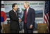 President George W. Bush shakes hands with Republic of Korea President Lee Myung-bak following their meeting at the G-8 Summit Wednesday, July 9, 2008, in Toyako, Japan.