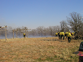 firefighters carrying out a prescribed fire on a reservation