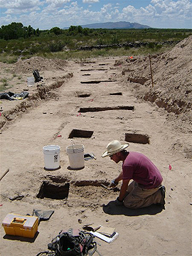 archeologist working near gravesite
