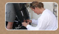 Russ Green and Brenda Altmeier assemble the diver propulsion vehicle