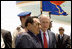 President George W. Bush embraces Egyptian President Hosni Mubarak upon his arrival Saturday, May 17, 2008, to Sharm el-Sheik International Airport in Sharm el-Shiek, Egypt. 