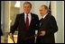 President George W. Bush and Russian President Vladimir Putin after exchanging documents of ratification inside the Konstantin Palace after a private meeting in St. Petersburg, Russia, June 1, 2003. White House photo by Paul Morse