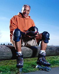 photo of man wearing rollerblades