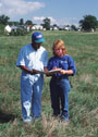 NRCS employee reviewing a conservation plan
