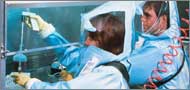 Two laboratorians at CDC's BioSafety Lab Photo