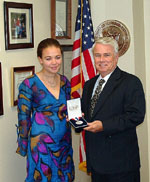 Congressman Gallegly awarded Caitlan Smith of Ojai the Silver Congressional Award Medal in November 2004.