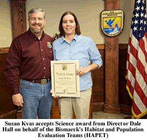 Susan Kvas receives Science award from Service Director Dale Hall