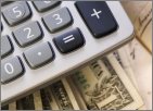 Calculator and dollar bills: Link to rebate calculator