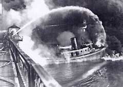 This image shows the Cuyahoga River on fire in 1969