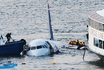 Passengers in an inflatable raft move away from an Airbus 320 US Airways aircraft that has gone down in the Hudson River in New York, Thursday.