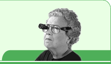 Older woman wearing eyeglasses with telescopic lens.