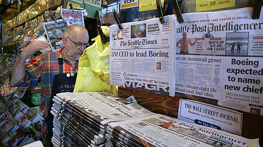 The Seattle <SPAN STYLE='font-style: italic'>Post-Intelligencer</SPAN> on sale at a newsstand in Seattle