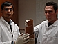 Researchers hold the polymer that is critical to their water filtration system.