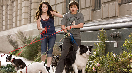 After finding a place to hide their dog Friday, Andi, played by Emma Roberts, left, and her brother Bruce, played by Jake T. Austin Hotel for Dogs