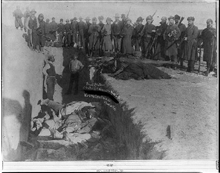 Burial of frozen corpses of Lakota Sioux Indians