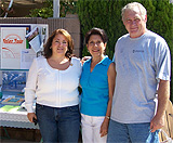 Picture of Linda with owners of Solar House.