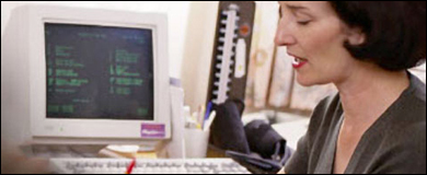 Woman working at a computer