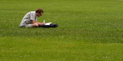 A NC State student enjoys a chance for outdoor studying.