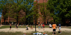 NC State students play volleyball on Tucker beach.