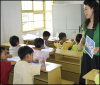 Photo: A teacher in a classroom with students