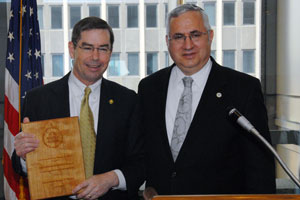 Congressman James T. Walsh (left) of New York receives a 2008 Environmental Quality Award from EPA Regional Administrator Alan J. Steinberg