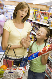 photo of mom and daughter grocery shopping