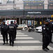 [Policemen stand in front of one of the Printemps Haussman department stores on December 16, 2008 in Paris.]