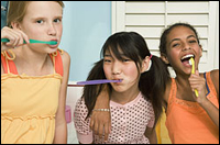 Photo: Girls brushing their teeth