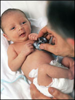 Baby being examined by a doctor