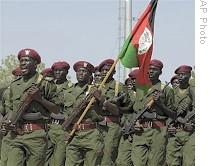 In this photo released by UN Mission in Sudan (UNMIS), Sudan People's Liberation Army soldiers parade during 4th anniversary celebrations of signing of Comprehensive Peace Agreement, Malakal, southern Sudan, 9 Jan. 2009