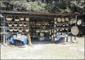  [ Basket seller's stand.  Photo credit: Zac Hart  ] 