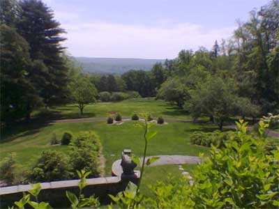 View from Grey Towers down the lawn and across a valley