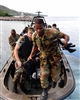 U.S. Navy sailors and members of the Jamaica Defense Force conduct a small boat exercise.
