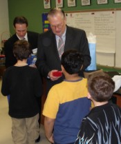 photo of Arden Bement with students at the "World of Motion" event