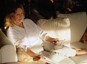 Photo of woman watching television alone