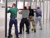 Law enforcement officers practicing in a firing range