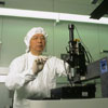 Materials researcher Stephen Hsu prepares to measure nanoscale friction between a diamond tip and a silicon surface.