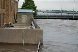 Seawall Blocking Flood Waters: Seawall withstanding flood waters (Waterloo, IA, USA)