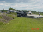 Collision of road tar tank truck with train.