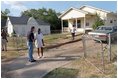 After helping build a house for Habitat for Humanity, President Bush meets some of his Waco neighbors. 