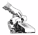Image of a hand holdinga phone receiver.